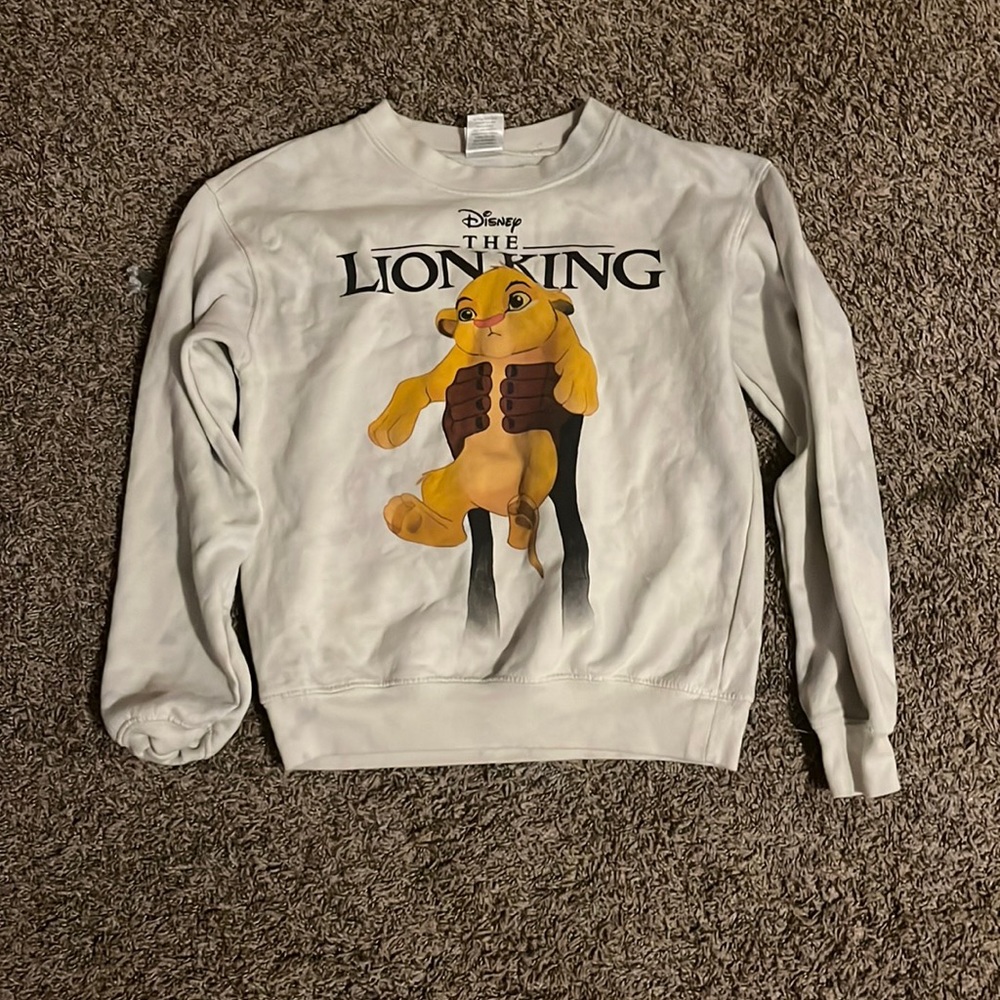 very comfortable lion king sweater ; cream